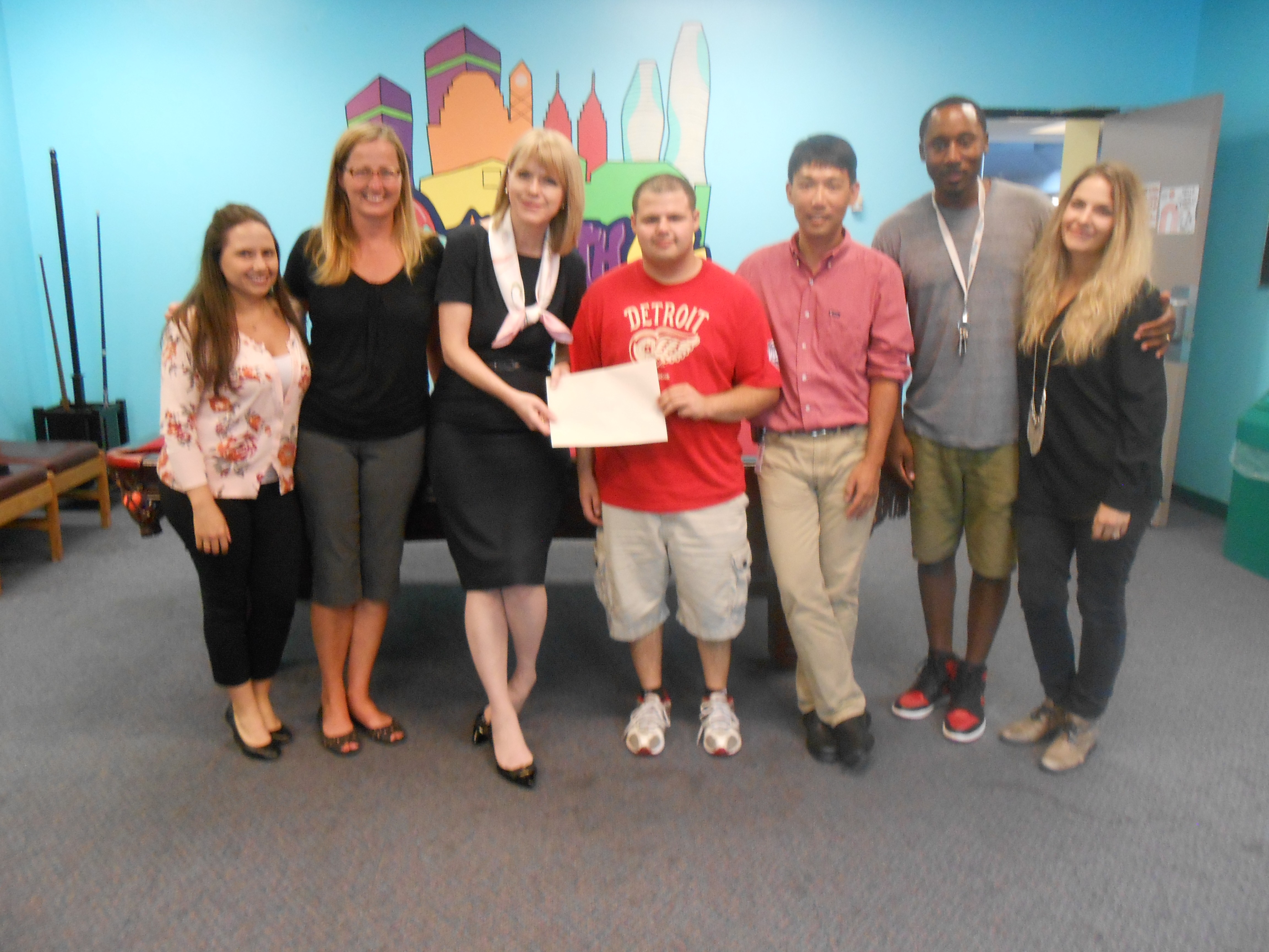 Community Foundation of Mississauga Executive Director Eileen MacKenzie with NYS staff and youth